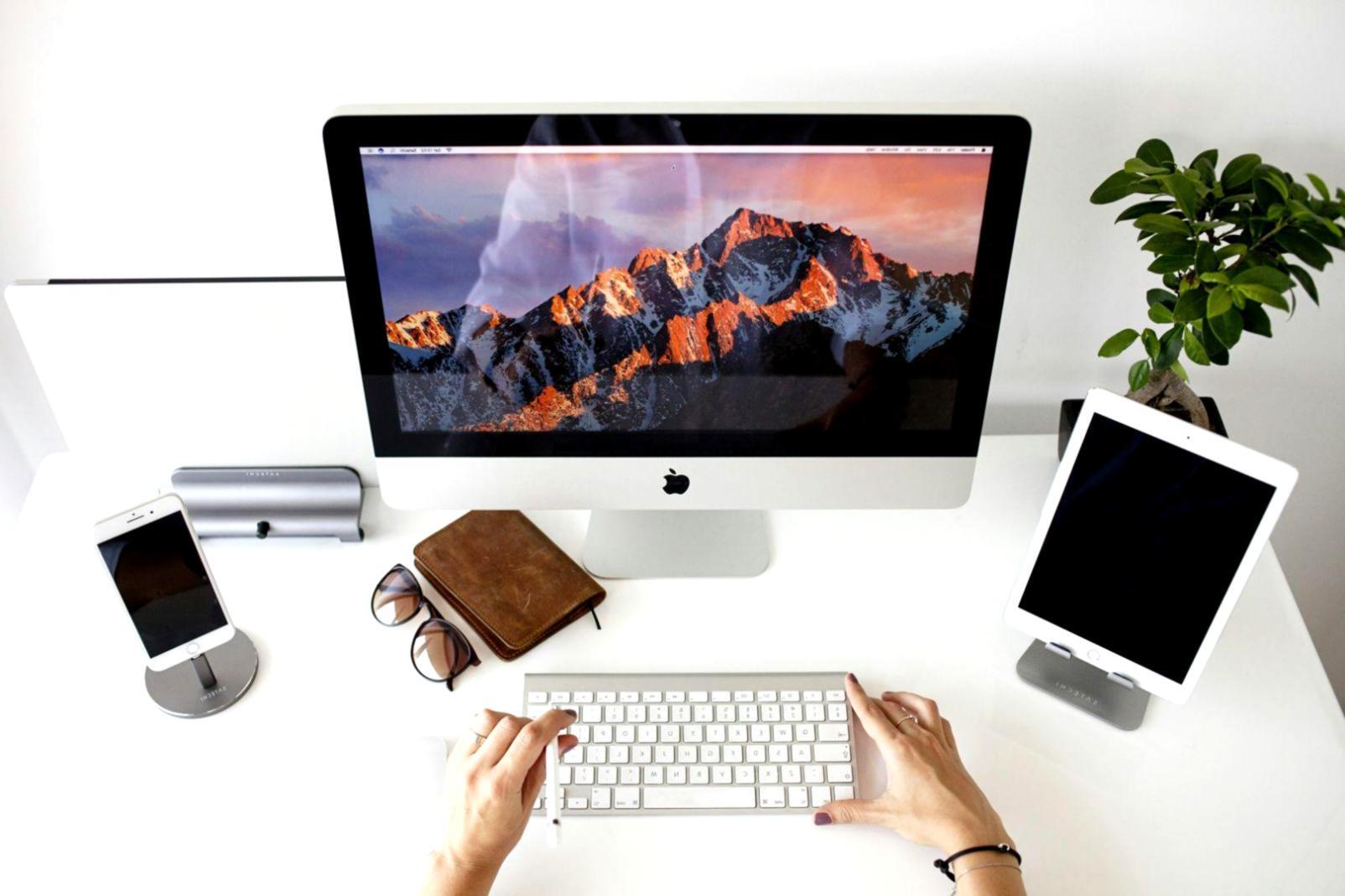 Financial planning workspace with organized documents and budgeting materials